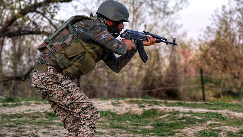 Indian+forces+kill+three+Pakistanis+behind+Kashmir+attack%2C+minister+says